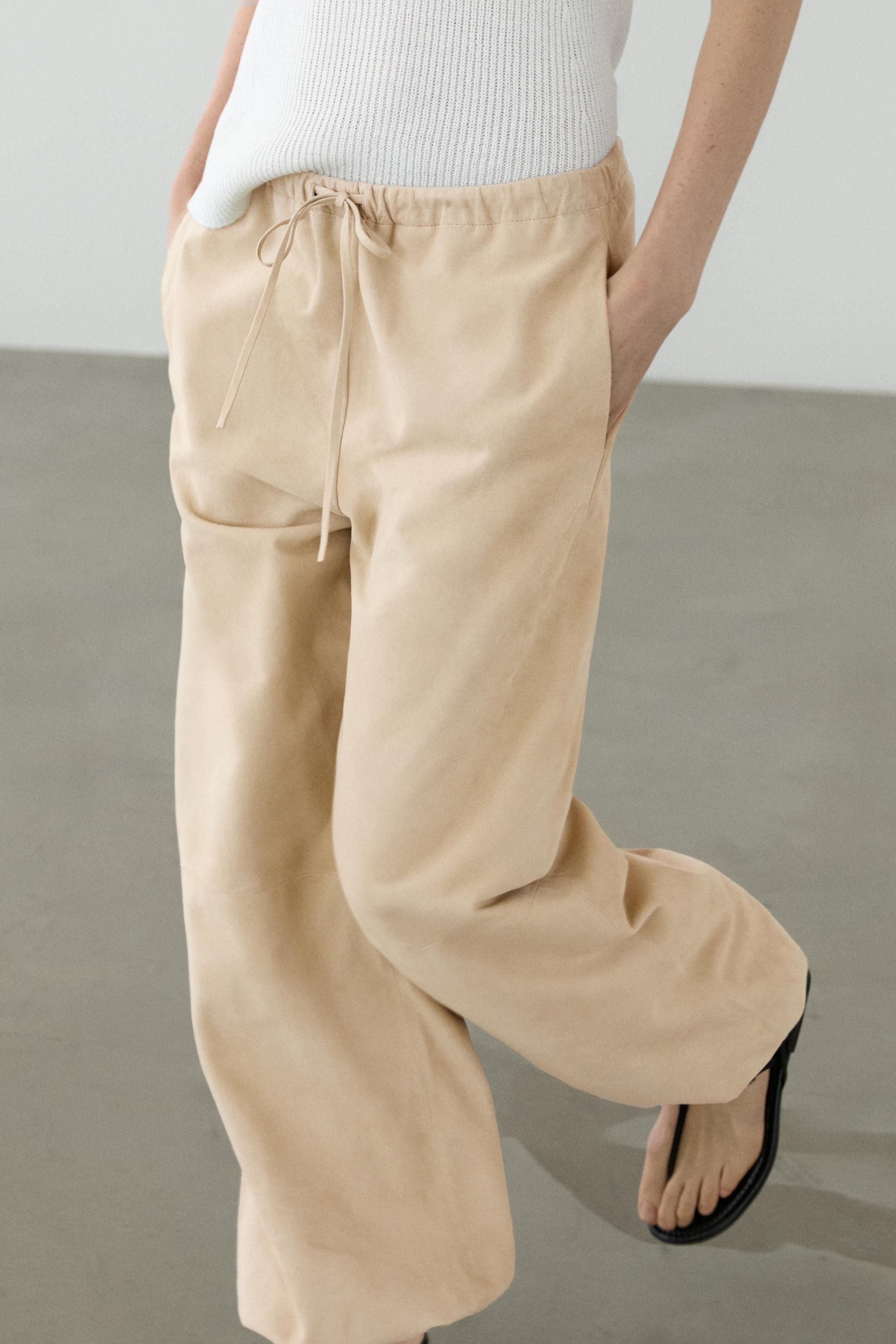Pantalon bouffant en cuir et daim